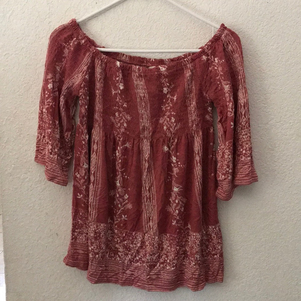 Off-shoulder rose color shirt